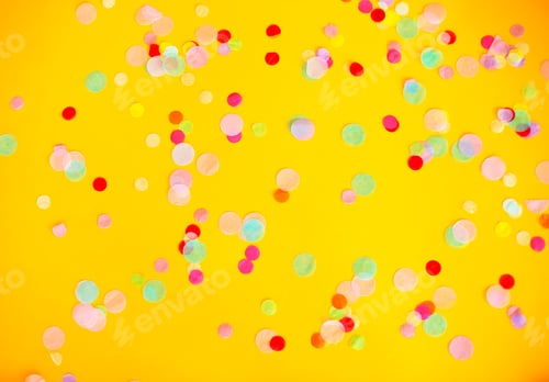 Preview: Colorful confetti on yellow table
