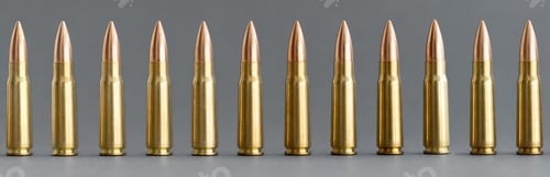Preview: Bullets on gray background. Cartridges 7.62 caliber for Kalashnikov assault rifle