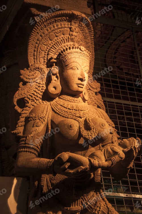 Preview: Carved sculpture of Hindu god and goddess at Meenakshi temple, Madurai, Tamil Nadu, India.