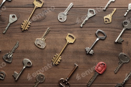 Preview: Many Different Keys On Wooden Table