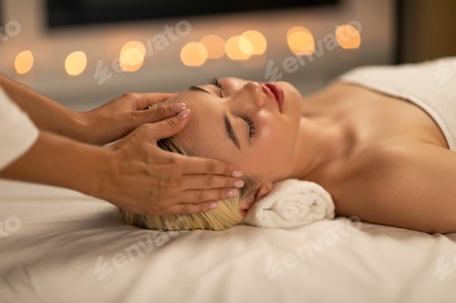 Preview: Calm Young Woman Receiving a Gentle Facial Massage