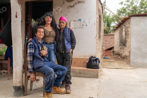 Preview: Latin american family posing outside their nursery with their pet ferret