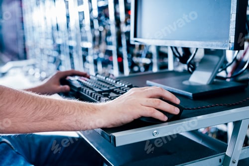 Preview: IT specialist working in bitcoin and crypto currency mining farm
