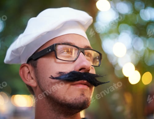 Preview: French attire. A young man dressed up in a beret and a fake mustache.