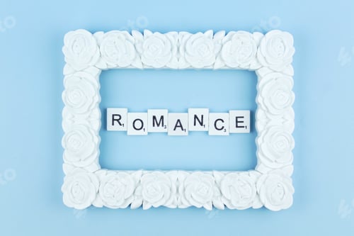Preview: Romance scrabble letters word on a blue background