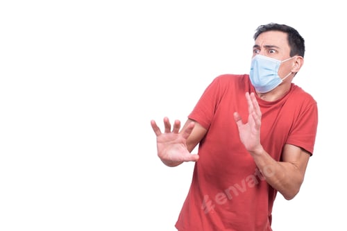 Preview: Scared man in protective mask during coronavirus pandemic