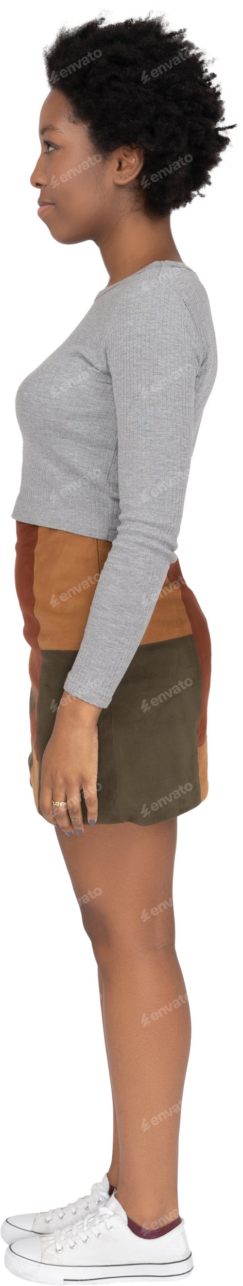Preview: a woman is standing with her hands on her hips