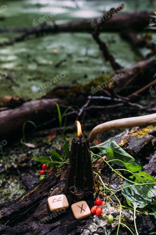 Preview: Mysterious black candle Occult, esoteric, divination and wicca concept. Halloween vintage background