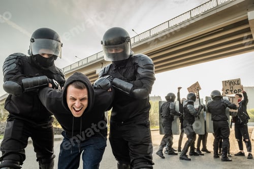 Preview: Riot officer stopping protester