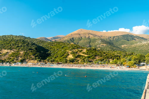 Preview: Albanian riviera beach with sunbeds near Vlore in summer vacation, Albania