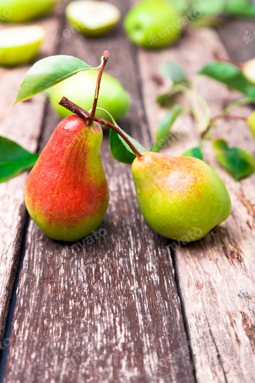 Preview: Pear on wooden rustic background.