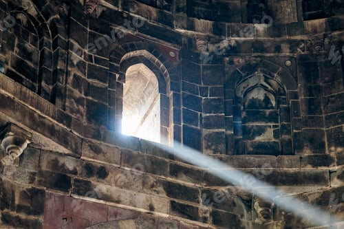 Preview: Beam of light from window of ancient indian tomb Bada Gumbad in New Delhi, India, white ray of light
