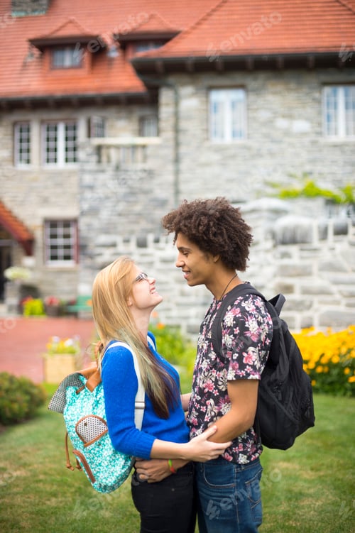 Preview: Young students hugging with backpacks