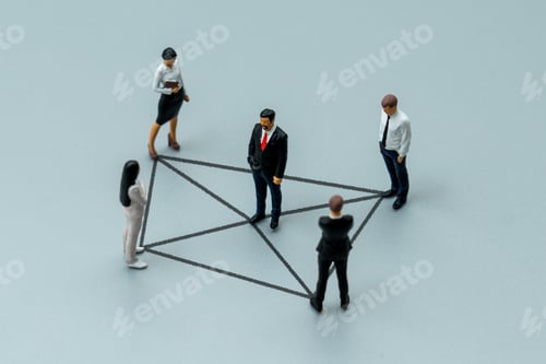 Preview: Miniature business figures are connected by drawn lines.
