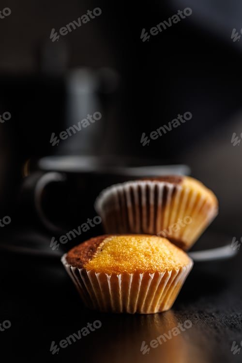 Preview: Close Up of a Muffins on black table.