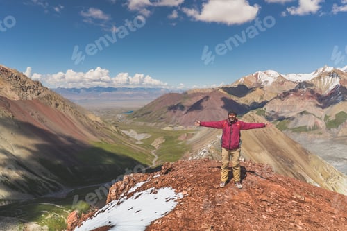 Preview: Backpacker In Front Of The Lenin Peak - Kyrgyz Pamir Mountains - Kyrgyzstan And Tajikistan Border
