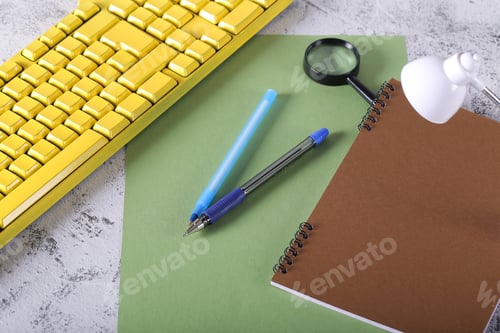 Preview: Paper Lamp Notebook And Keyboard Are On The Table