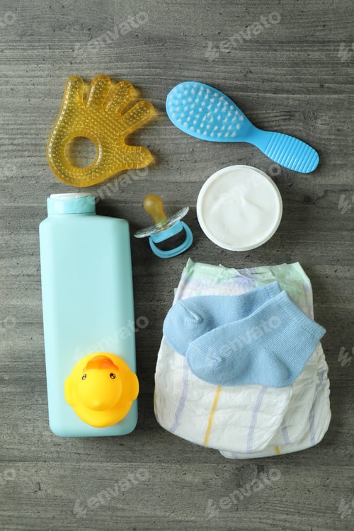 Preview: Baby hygiene accessories on gray textured table
