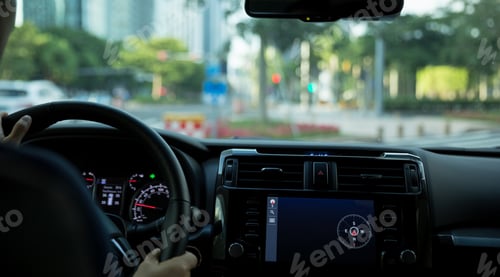 Preview: Driving car on city road awaiting in front of the zebra crossing