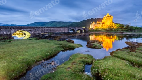 Preview: Dusk over loch at Eilean Donan Castle in Scotland, UK