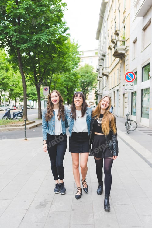 Preview: Three young beautiful women posing outdoor