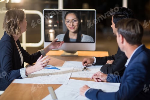 Preview: Business Team Having Video Conference In The Conference Room