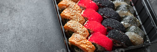 Preview: Sushi Rolls Set Salmon, Rice, Tuna, Nori Wakame Tobiko Caviar Fresh Snack Ready To Eat On The Table