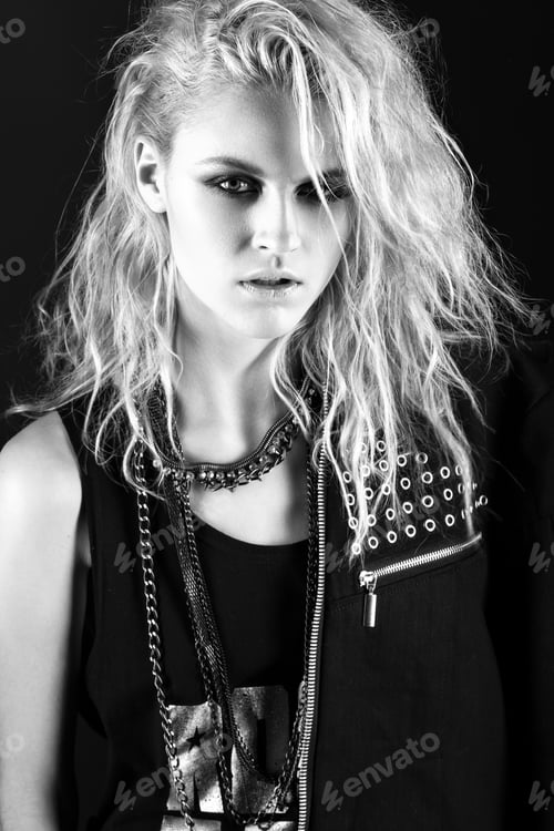 Preview: Daring girl model in black leather dress, style of rock