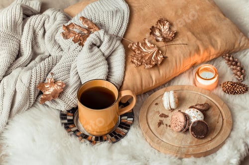 Preview: Still life Cup of tea with autumn leaves and sweater.