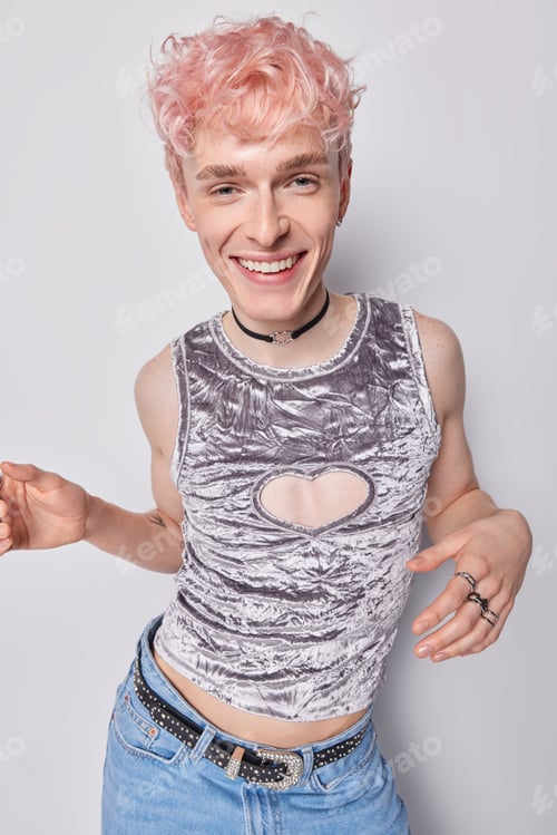 Preview: Cheerful carefree homosexual man with pink hair dances and has fun romantic mood dressed in