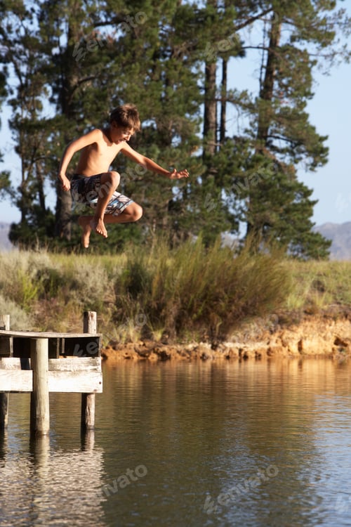 Preview: Boy Jumping From Jetty Into Lake