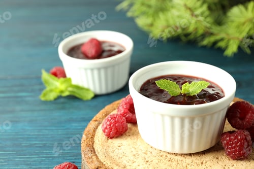 Preview: Concept of tasty food with raspberry jam on wooden background