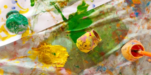 Preview: Paints and brushes. Used paint palette, watercolors, brush and dirty colored bottles - art lesson