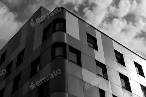 Preview: Facades of high buildings and cloudy sky