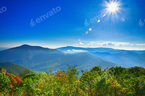 Preview: The sun shining over the Blue Ridge Mountains of Virginia in the autumn.