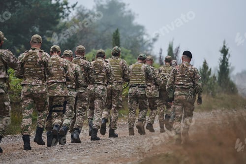 Preview: An elite military unit, led by a major, confidently parades through dense forest, showcasing
