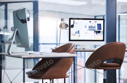 Preview: Webpage advert on computer desktop screen monitor in an empty call centre office. Operating helpdes