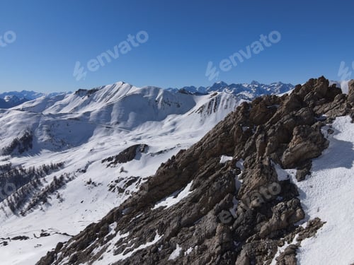 Preview: Beautiful view of a mountainous winter landscape with the alps covered in snow