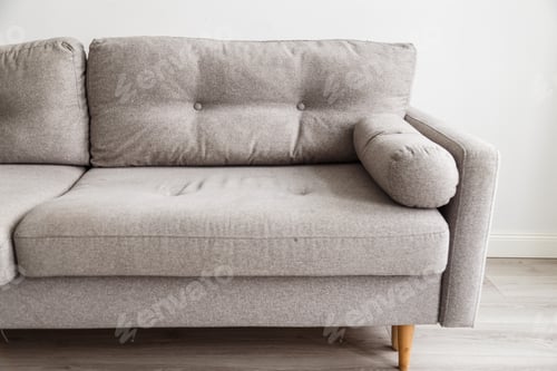 Preview: Grey sofa with wooden legs in monochromatic living room