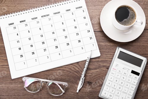 Preview: Flat lay composition with calendar and cup of coffee on wooden table