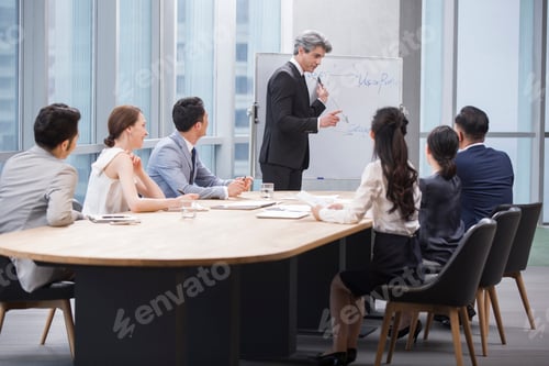 Preview: Business people having meeting in board room