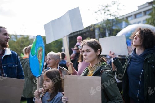 Preview: People with placards and posters on global strike for climate change