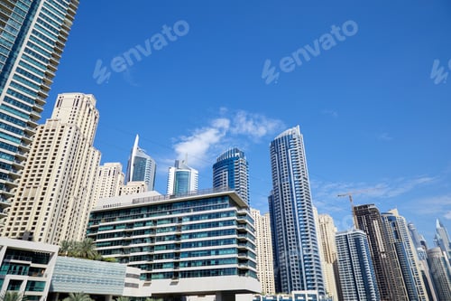 Preview: Dubai Marina skyscrapers low angle view in a sunny day, clear blue sky in Dubai