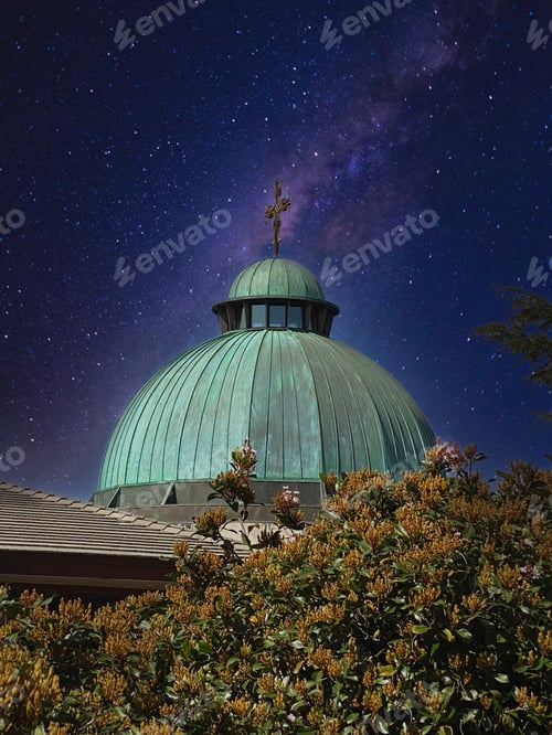 Preview: Beautiful night sky with Milky Way right behind the cross of a Catholic church parish in San Diego.