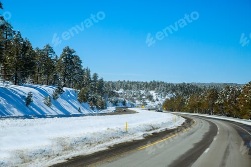 Preview: Winter road trees with the mountain snow landscape in Arizona