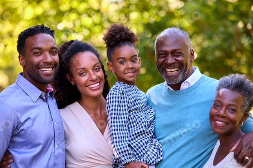 Preview: Portrait Of Multi-Generation Family Enjoying Walk In Countryside Together