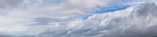 Preview: Panoramic View of Puffy Cloudscape during a colorful summer day