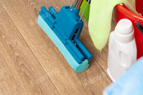 Preview: Cleaning tools for house cleaning on wooden floor