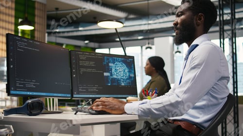 Preview: Technician using mockup laptop next to office coworkers developing applications