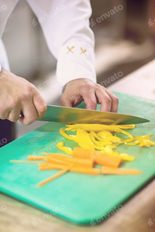 Preview: Chef hands cutting fresh and delicious vegetables